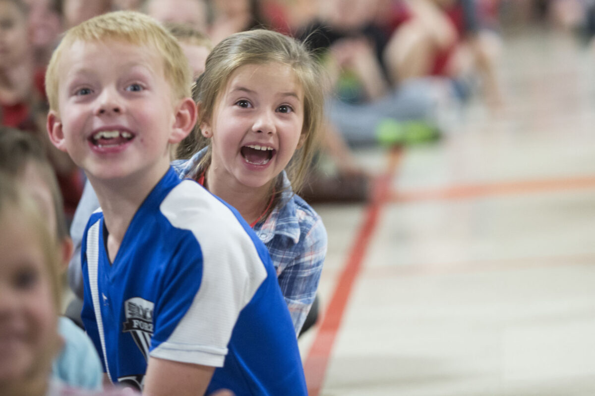 This little piggy got kissed West Bountiful principal puckers up